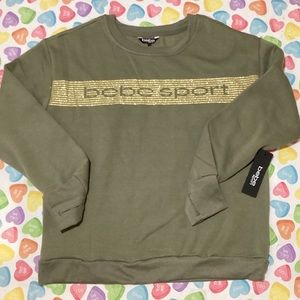 BEBE Women’s Military Green Long Sleeve Sweater Golden Logo with thumb holes